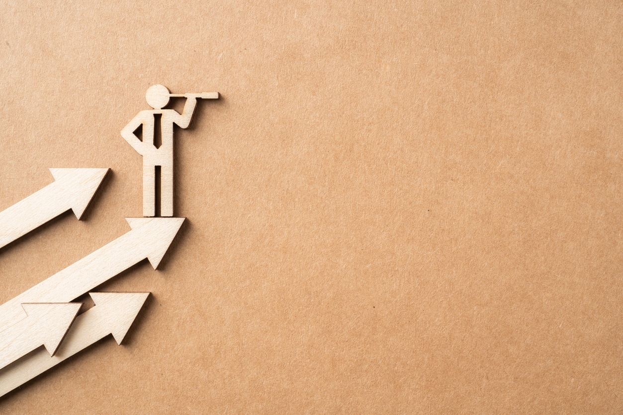 wooden businessman with leadership concept